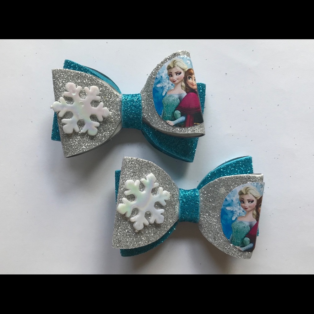 Elsa and Anna blue/silver bows.